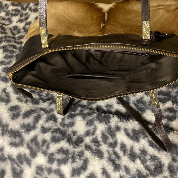 👜 Wilson’s Leather 👜
Cow print bag 🤠 
{new + unused} 
mint condition. - Picture 4 of 6